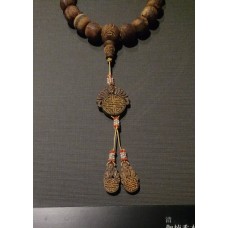 Agarwood bead bracelet, solar cross design